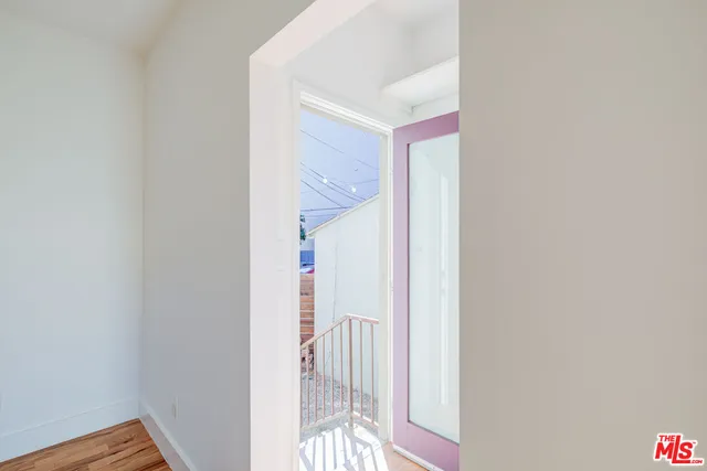 a view of a balcony with an outdoor space