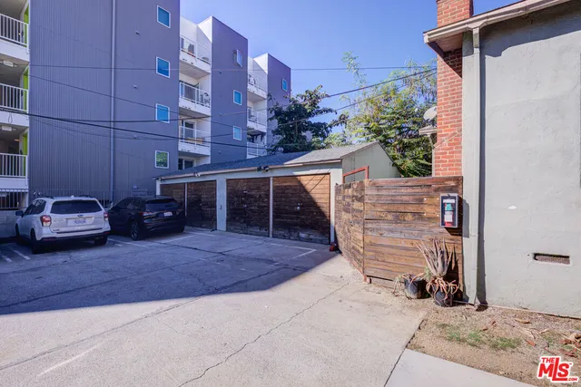 a narrow alley leading to a building