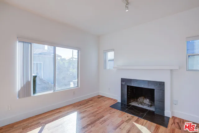 a living room with a fireplace