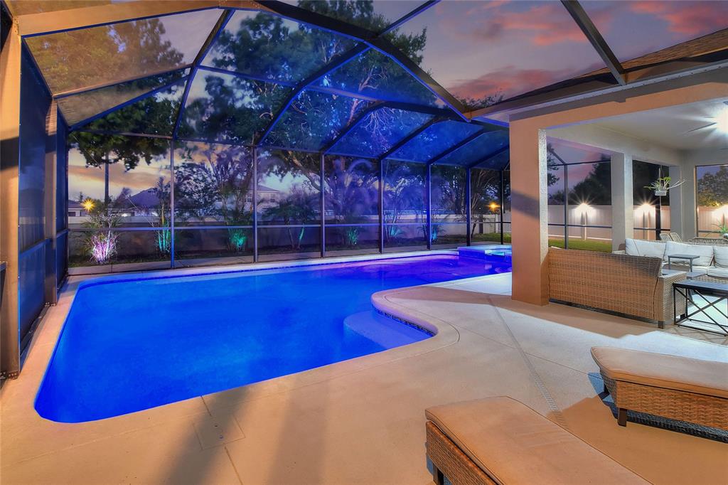 232 Magneta Loop Auburndale, FL 33823 - Photo 17 of 80 a view of a swimming pool with a patio