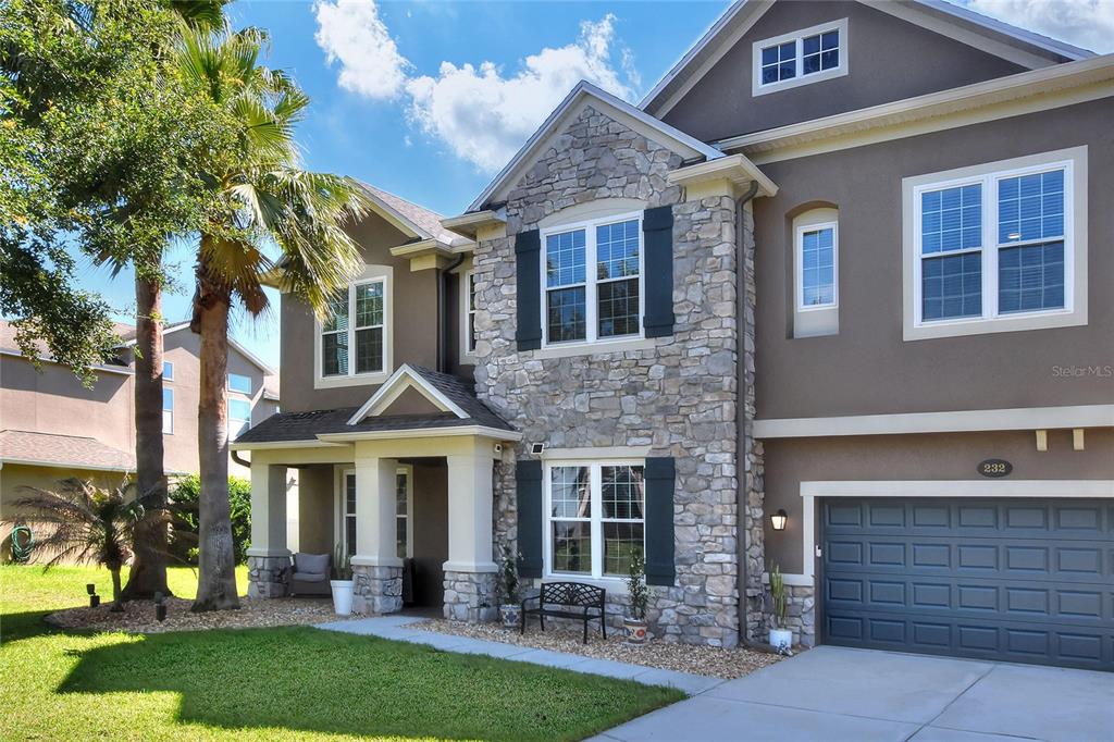 232 Magneta Loop Auburndale, FL 33823 - Photo 29 of 80 a front view of a house with a yard