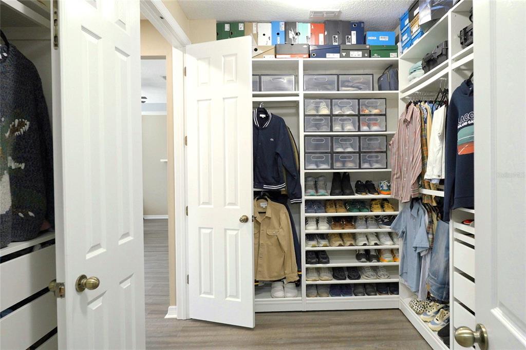 232 Magneta Loop Auburndale, FL 33823 - Photo 58 of 80 a view of walk in closet with empty racks