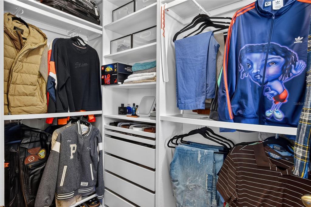 232 Magneta Loop Auburndale, FL 33823 - Photo 66 of 80 a view of walk in closet with clothes and shoes