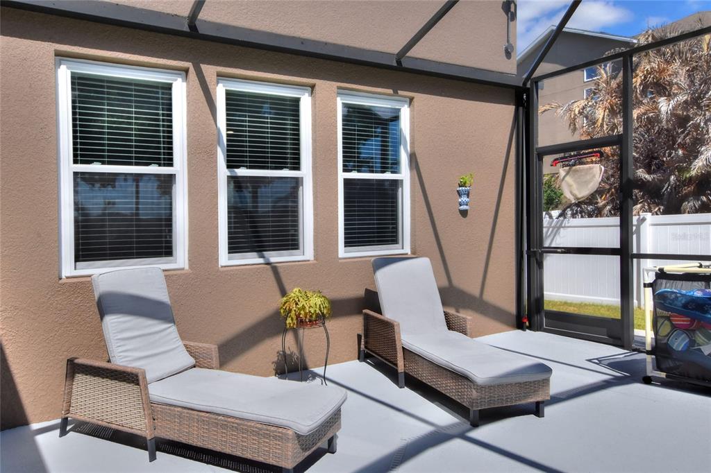 232 Magneta Loop Auburndale, FL 33823 - Photo 73 of 80 a view of a two chairs in the patio