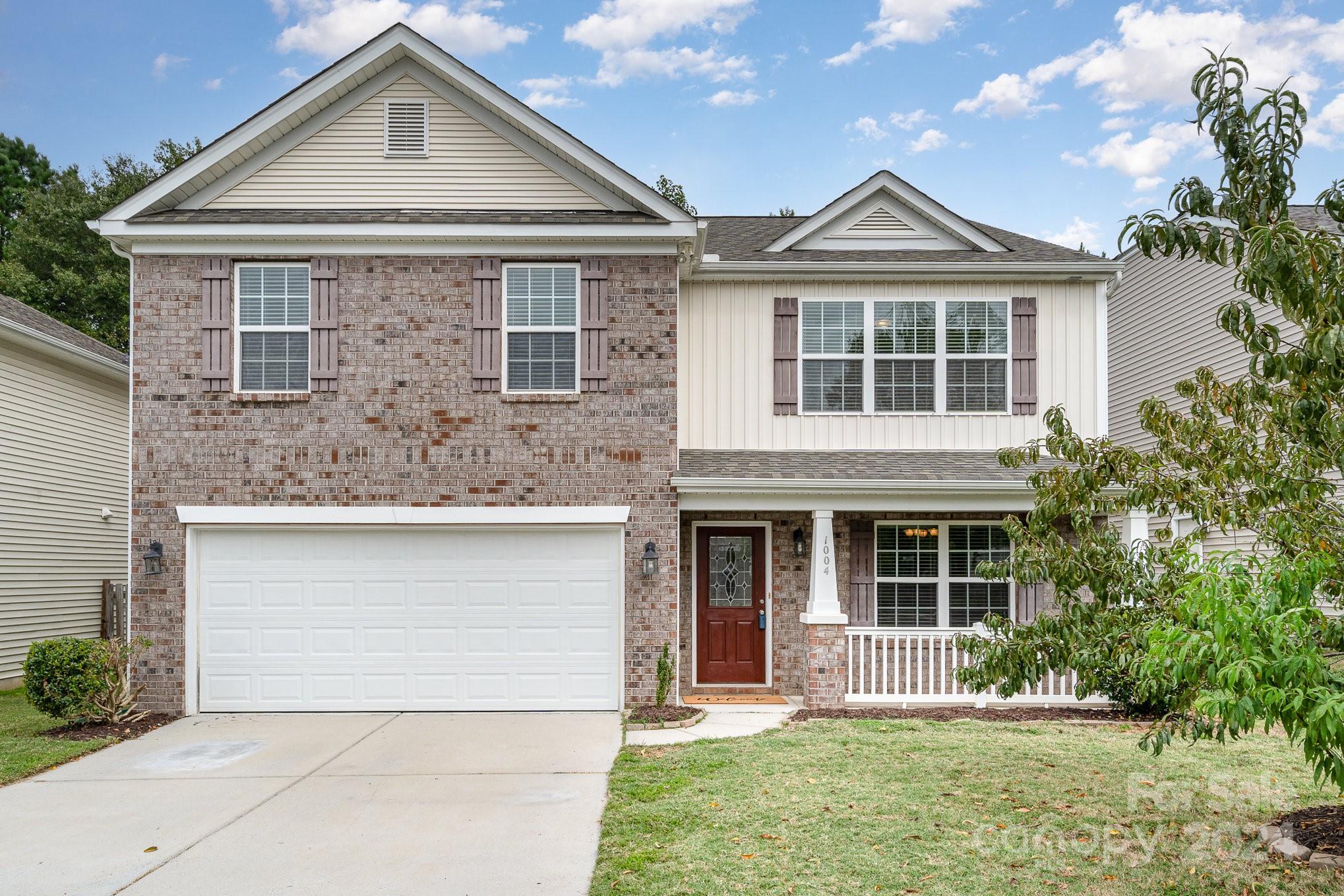 1004 Marcus Street Indian Land, SC 29707 - Photo 1 of 48 front view of a house with a yard