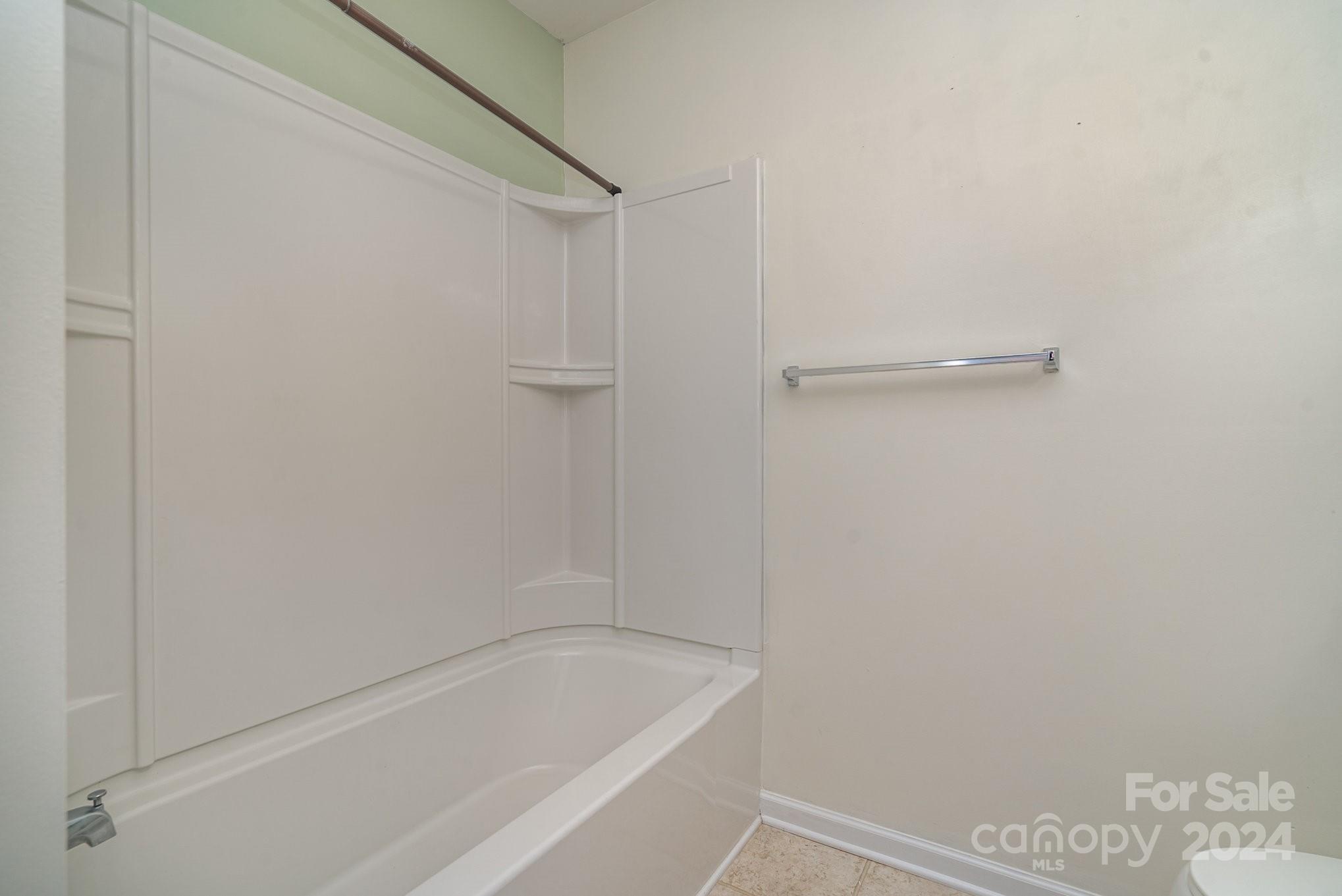1004 Marcus Street Indian Land, SC 29707 - Photo 35 of 48 a bathroom with a bathtub