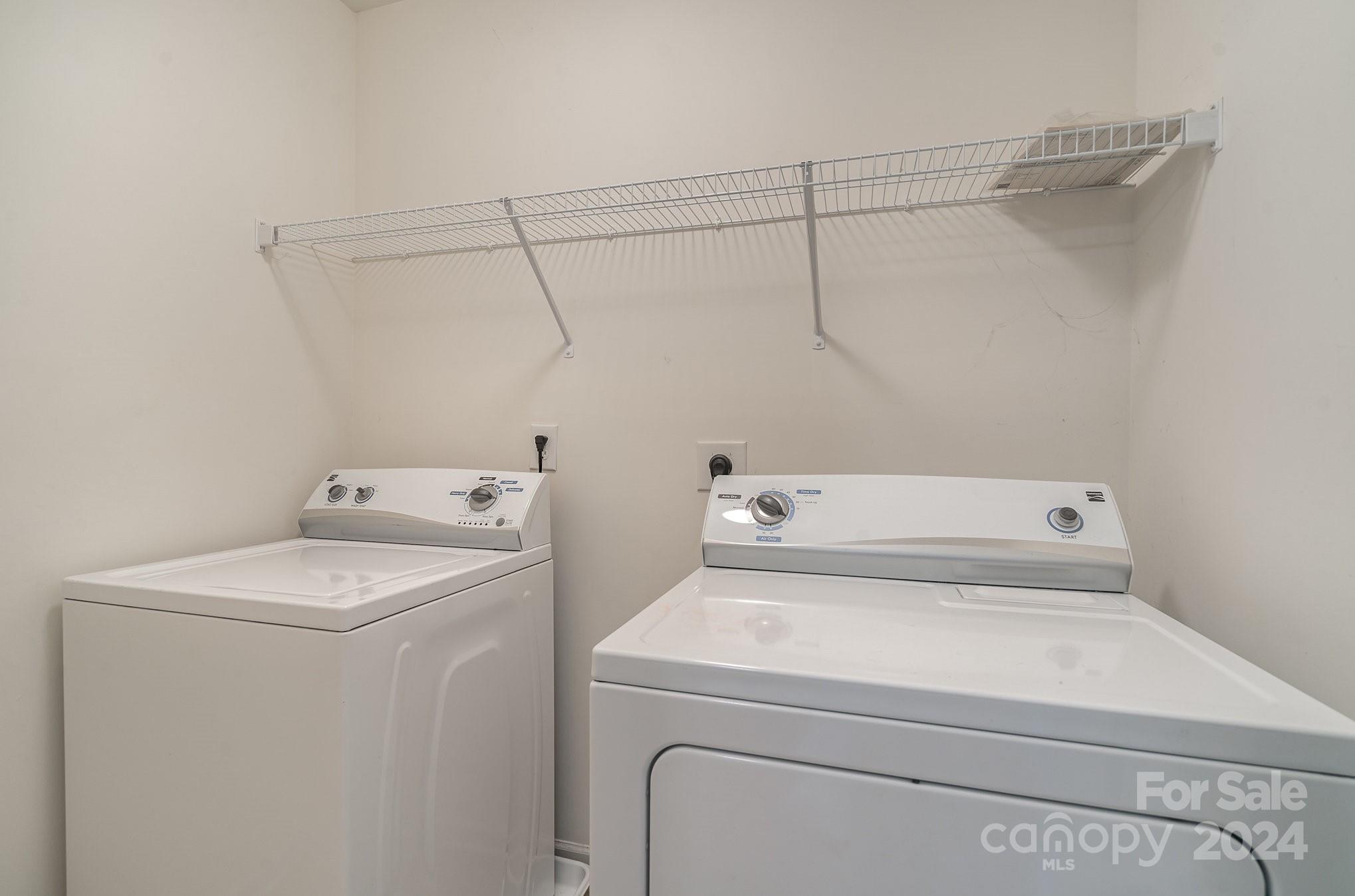 1004 Marcus Street Indian Land, SC 29707 - Photo 40 of 48 a utility room with dryer and washer