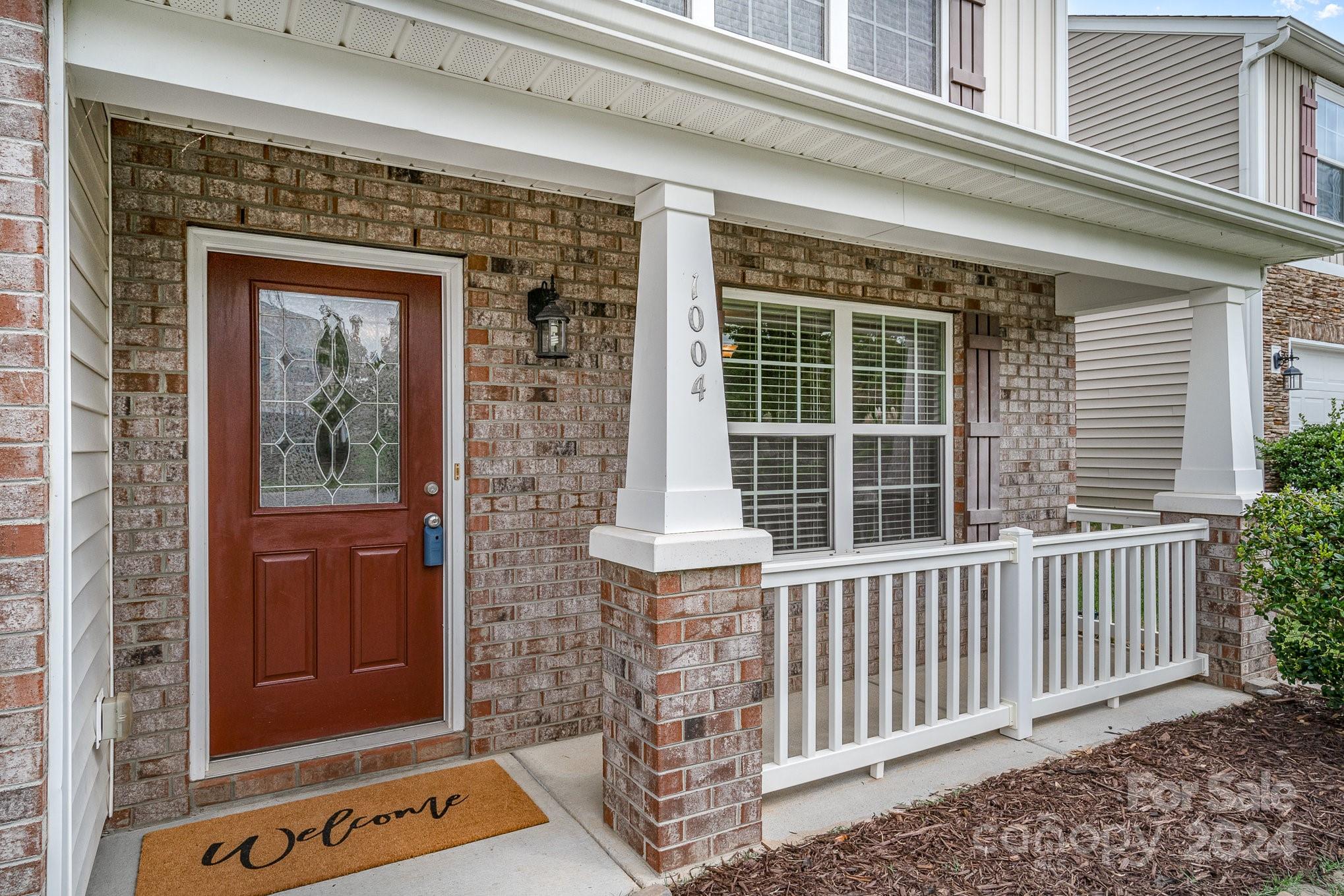 1004 Marcus Street Indian Land, SC 29707 - Photo 5 of 48 a front view of a house with a porch