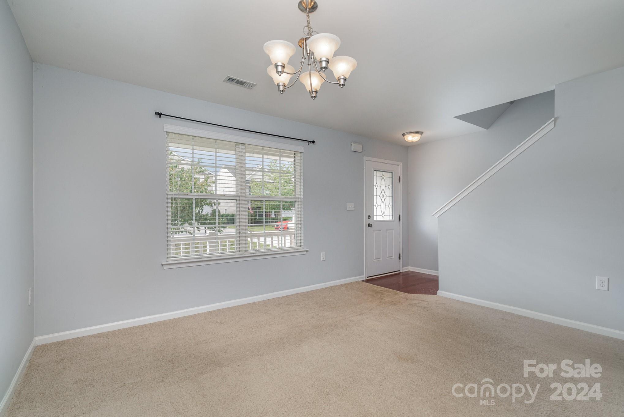 1004 Marcus Street Indian Land, SC 29707 - Photo 6 of 48 a view of an empty room with a window