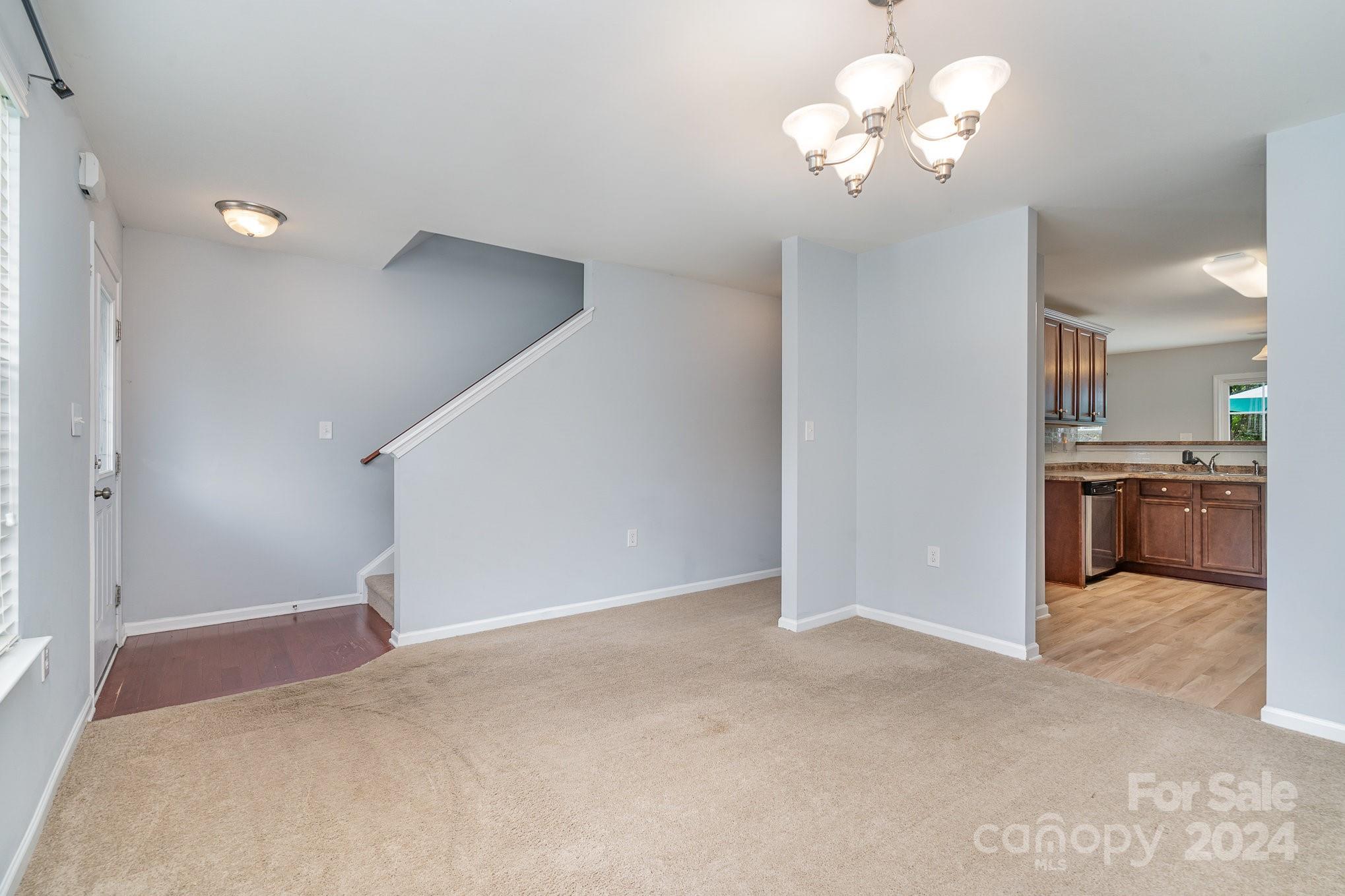 1004 Marcus Street Indian Land, SC 29707 - Photo 9 of 48 a view interior of the house and chandelier fan