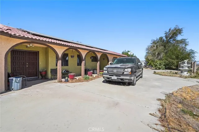 a view of a back yard of the house