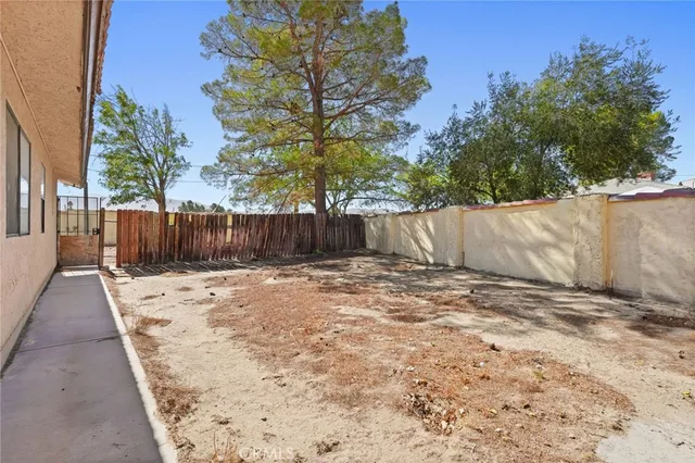 a very nice looking dining room with a large window