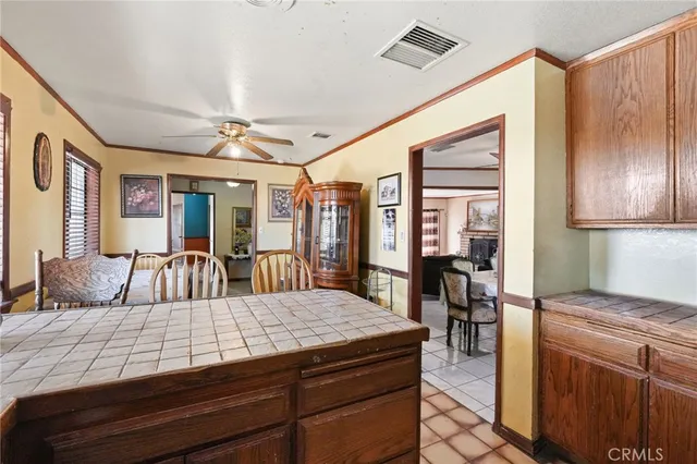 a bedroom with a bed and cabinets