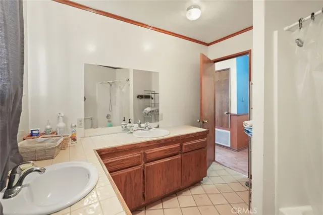 a view of a livingroom with furniture and a window