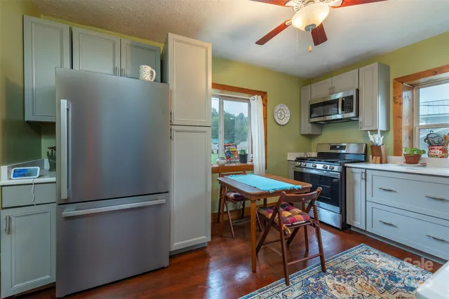 a room with furniture and a window