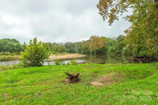 a view of outdoor space with deck and yard