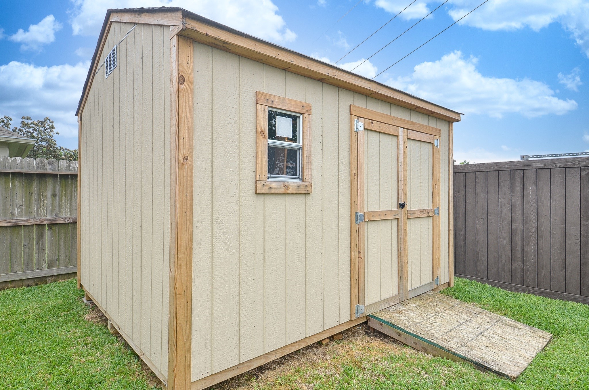 9222 Sorrell Hollow Lane Rosenberg, TX 77469 - Photo 24 of 24 Spacious 10x12 storage shed with interior shelving, added in 2025 and included with the property.