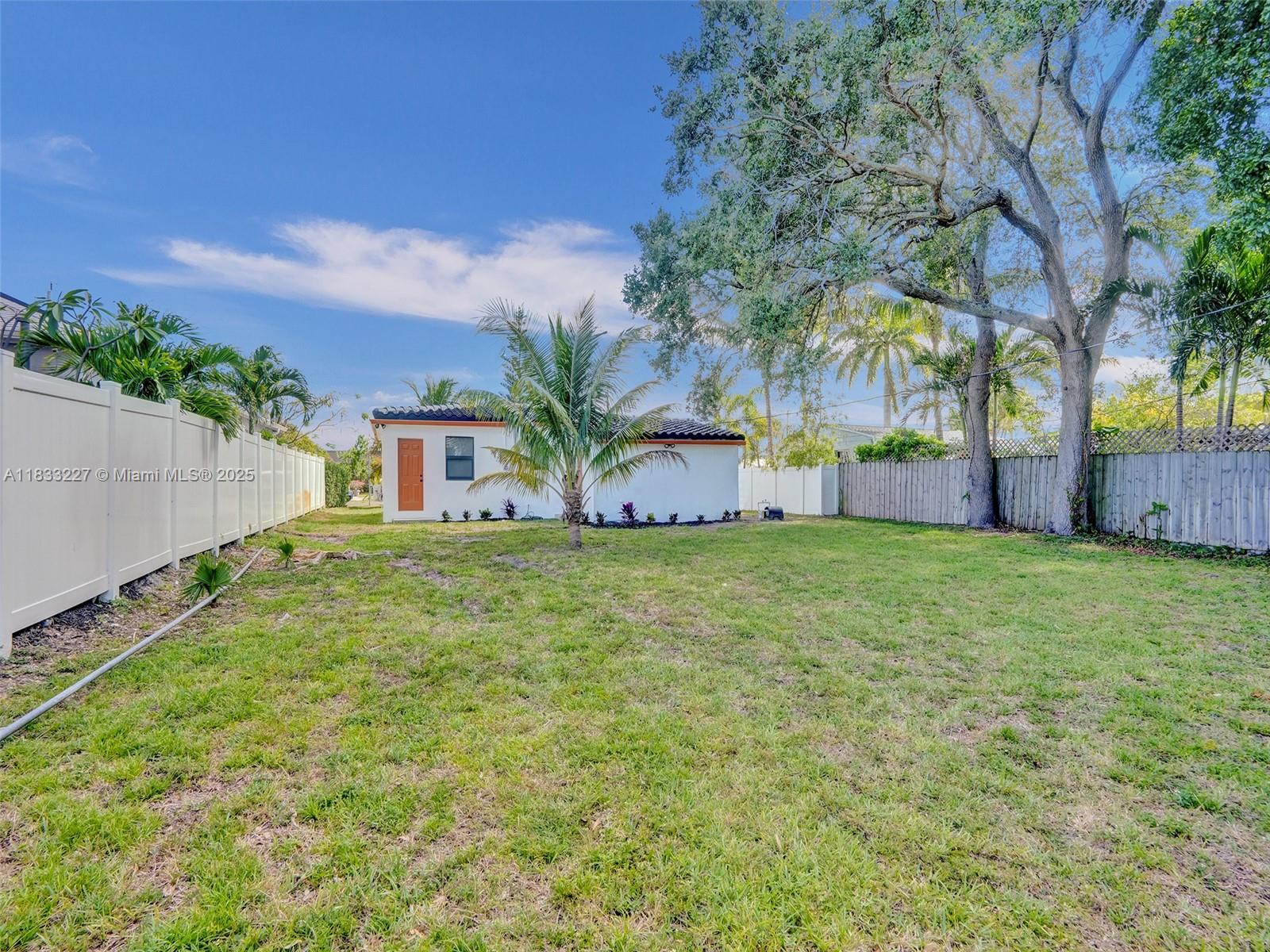 905 Southwest 22nd Street Fort Lauderdale, FL 33315 - Photo 24 of 25 a front view of house with yard and seating area