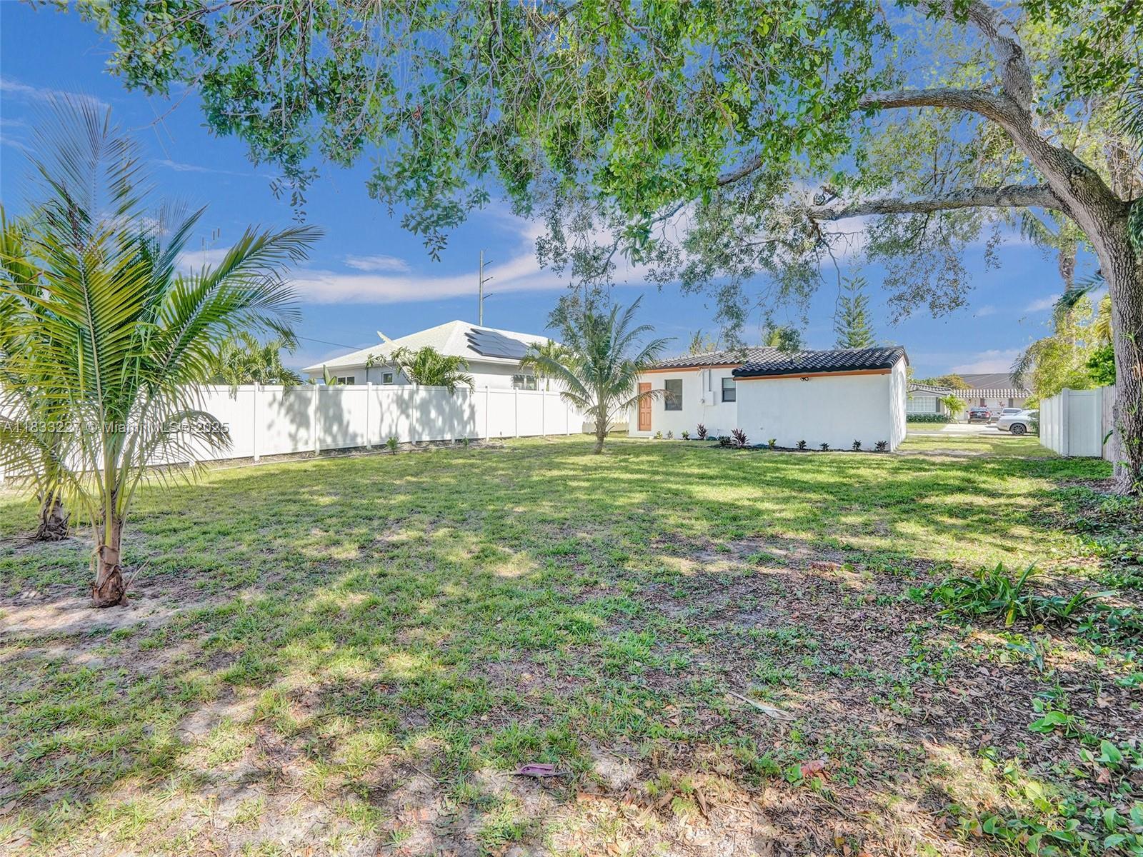905 Southwest 22nd Street Fort Lauderdale, FL 33315 - Photo 25 of 25 a view of a house with a yard