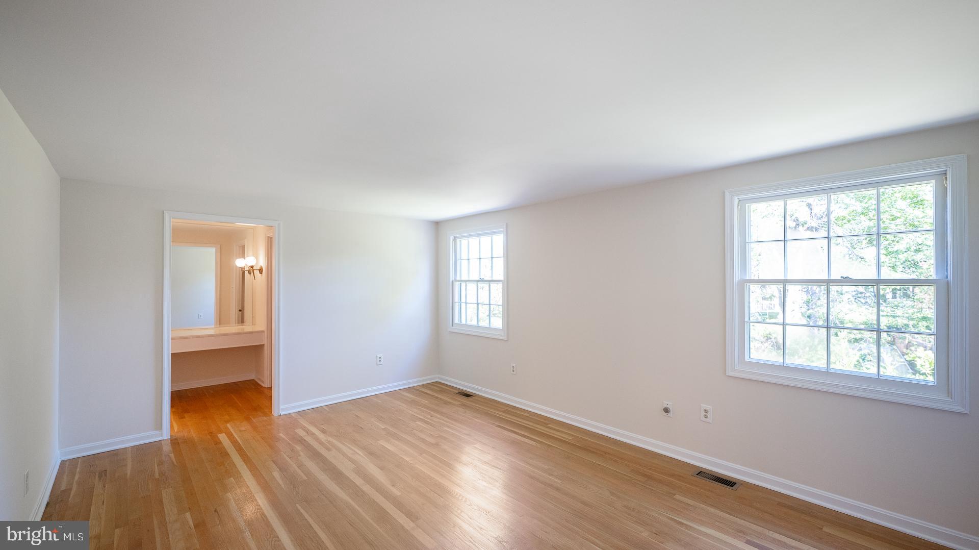 3017 Birchtree Lane Silver Spring, MD 20906 - Photo 24 of 39 Upper level primary bedroom with wood floors