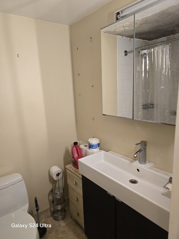 200 Swanton Street, Unit T35 Winchester, MA 01890 - Photo 13 of 36 a bathroom with a sink toilet and shower