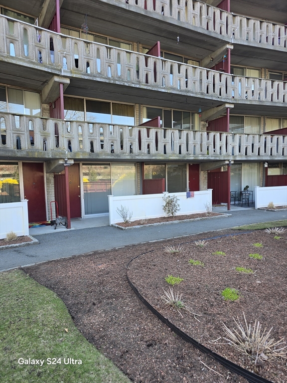 200 Swanton Street, Unit T35 Winchester, MA 01890 - Photo 14 of 36 a view of a building with a balcony