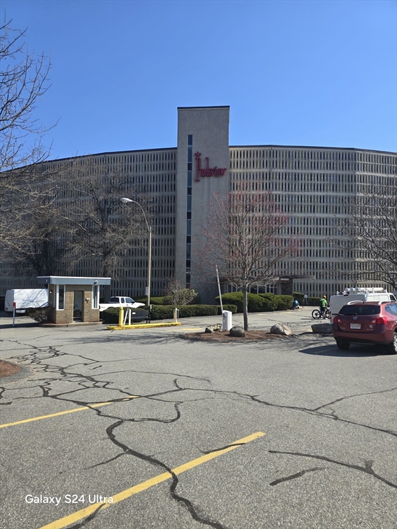 200 Swanton Street, Unit T35 Winchester, MA 01890 - Photo 2 of 36 front view of a building with parked cars