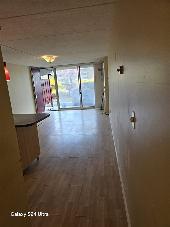 200 Swanton Street, Unit T35 Winchester, MA 01890 - Photo 25 of 36 a view of an entryway with wooden floor
