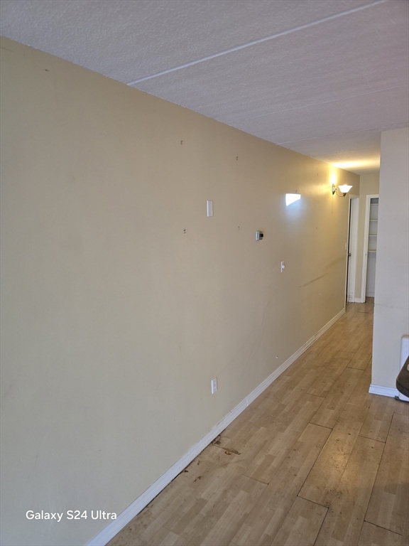 200 Swanton Street, Unit T35 Winchester, MA 01890 - Photo 5 of 36 a view of hallway with a large window