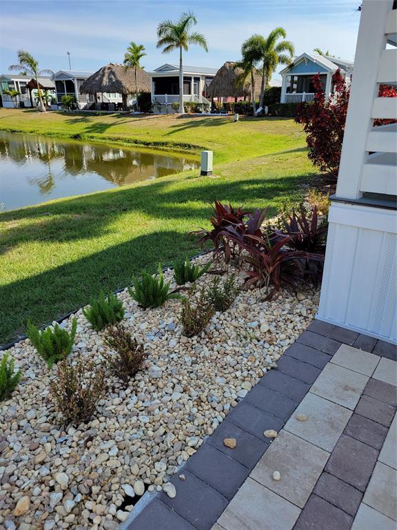 617 Southwest 34th Cove Okeechobee, FL 34974 - Photo 28 of 39 a view of a swimming pool with a yard