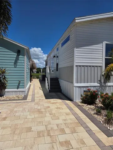 a view of a back yard of the house