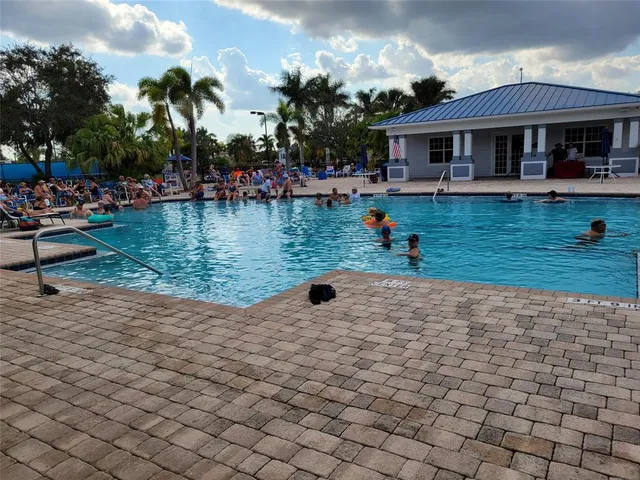 a view of a building with outdoor seating