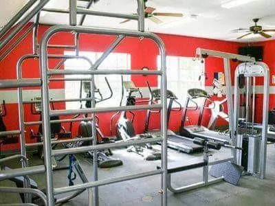 an outdoor space with swimming pool and furniture