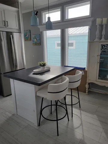a table and chairs in a kitchen