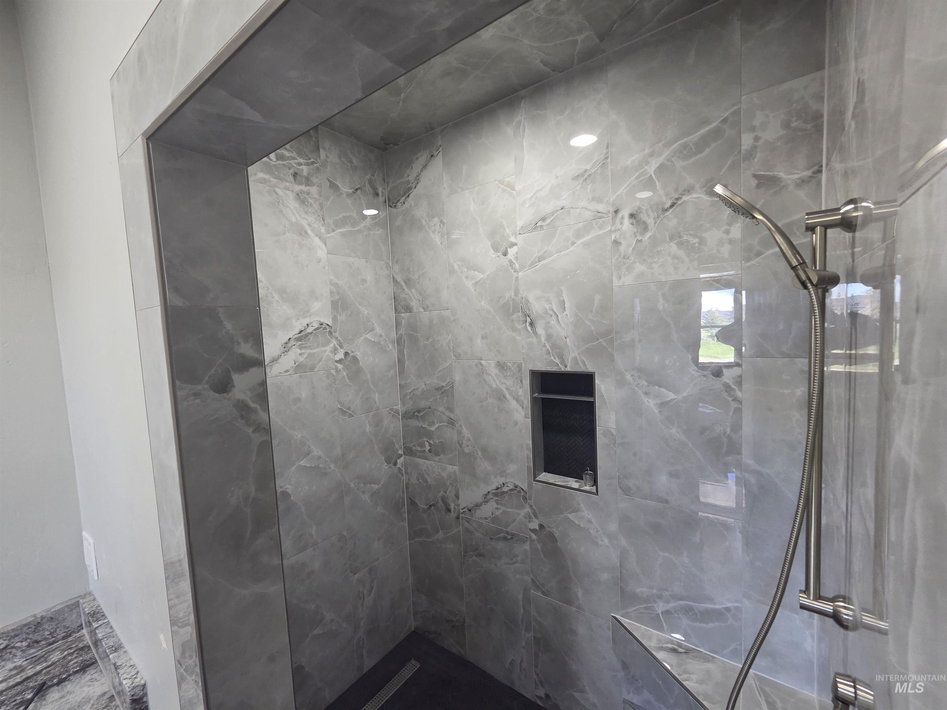 39 Lakeside Loop Burley, ID 83318 - Photo 7 of 15 Full bathroom with a marble finish shower