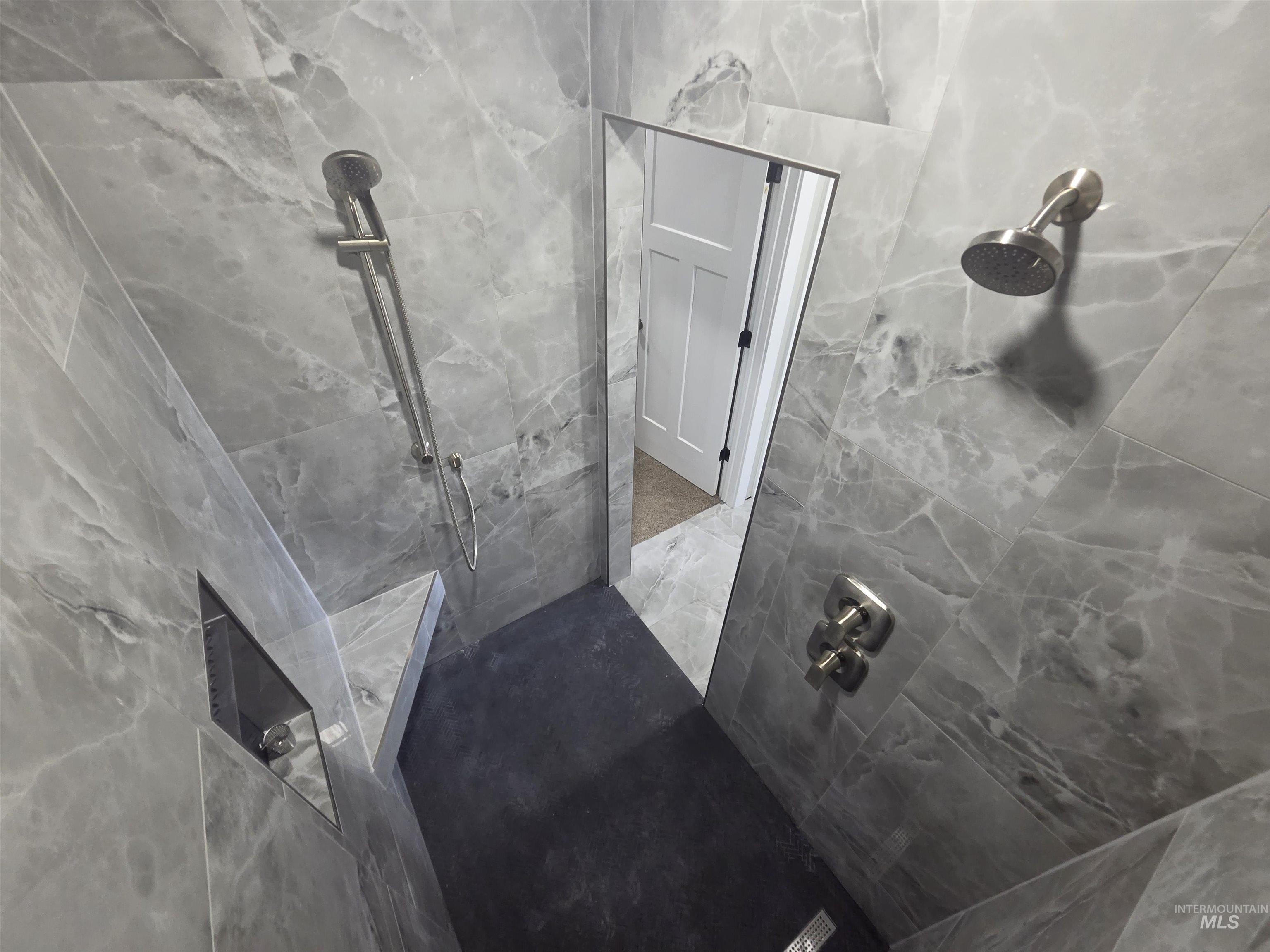 39 Lakeside Loop Burley, ID 83318 - Photo 8 of 15 Bathroom with a marble finish shower