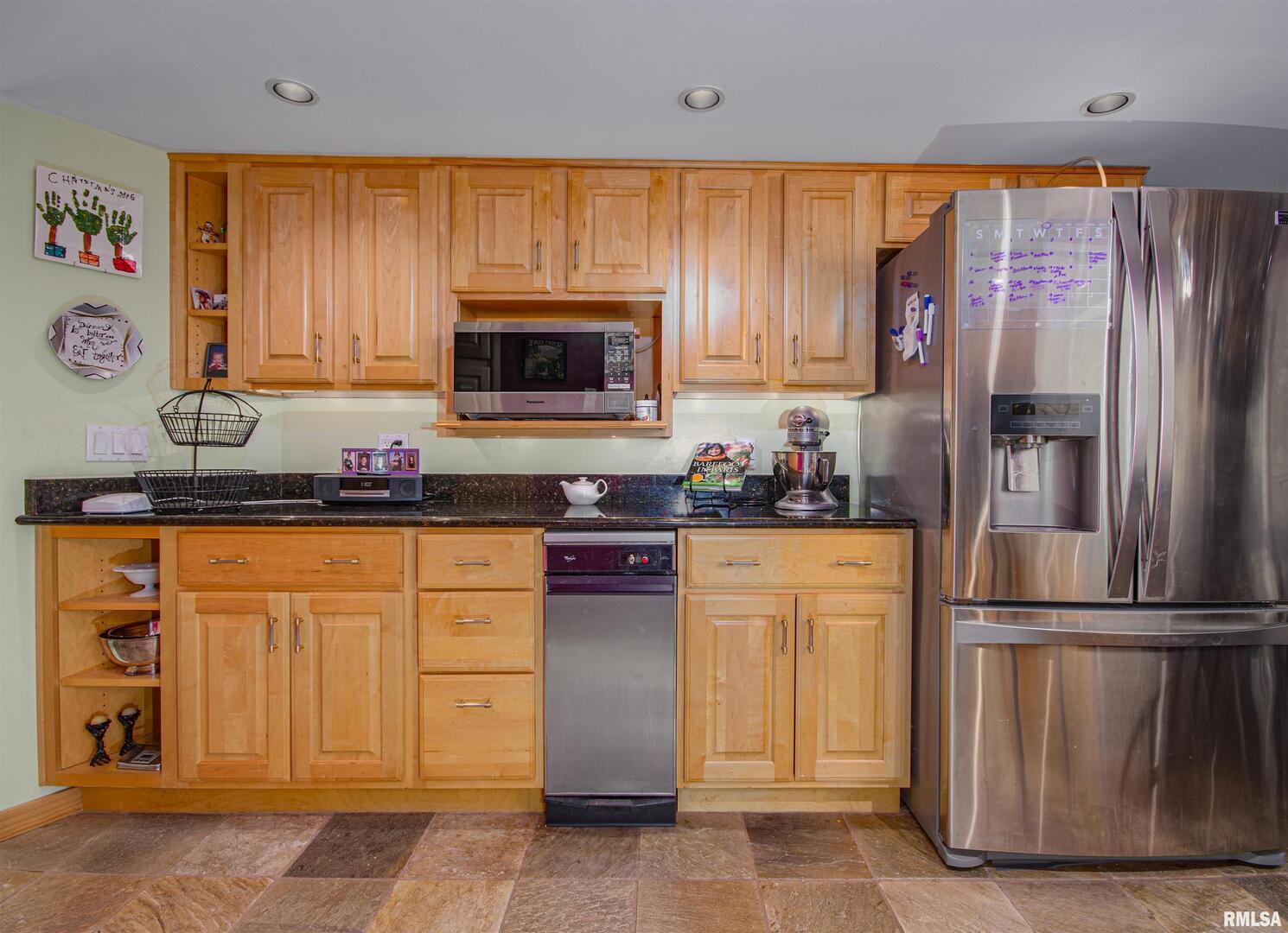 1114 South Perrine Centralia, IL 62801 - Photo 11 of 73 a kitchen with granite countertop a refrigerator stove top oven and sink