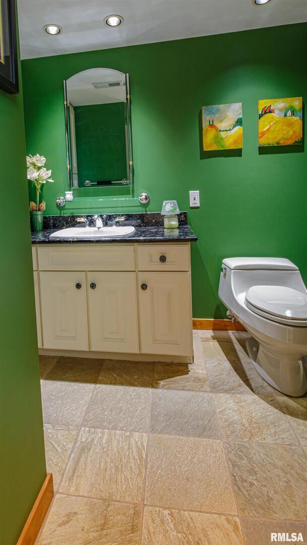 1114 South Perrine Centralia, IL 62801 - Photo 14 of 73 a bathroom with a sink and mirror