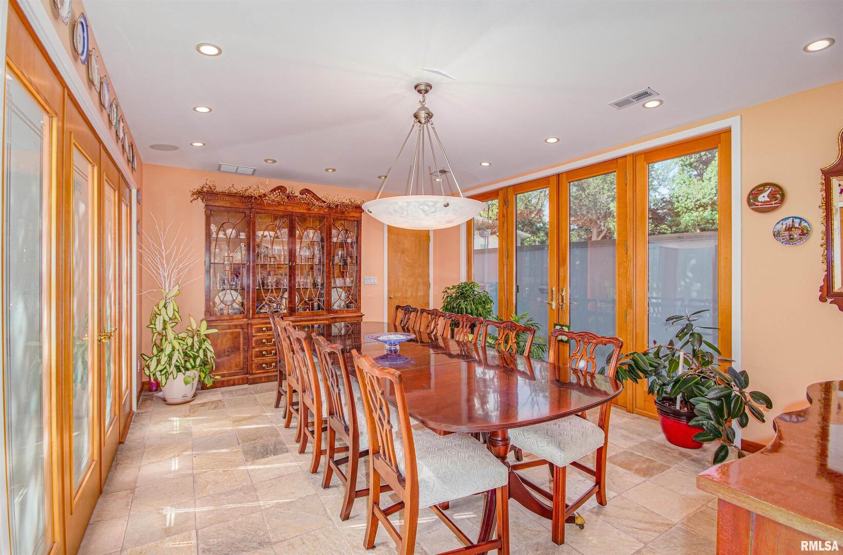 1114 South Perrine Centralia, IL 62801 - Photo 18 of 73 a dining room filled with furniture and a potted plant