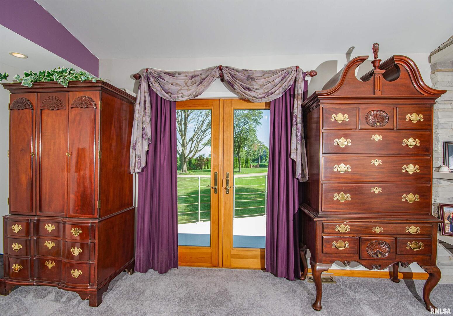 1114 South Perrine Centralia, IL 62801 - Photo 32 of 73 a view of a bedroom with a door and a chandelier