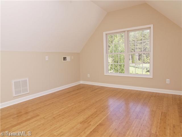 7809 Perthshire Drive Oak Ridge, NC 27310 - Photo 12 of 15 Bonus. Even that Bonus room is beautiful! Imagine the endless possibilities of this space!