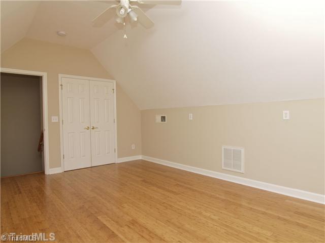 7809 Perthshire Drive Oak Ridge, NC 27310 - Photo 13 of 15 Bonus. The bonus room even has a large closet, imagine craft storage, a computer space, board game storage, the possibilites are endless!
