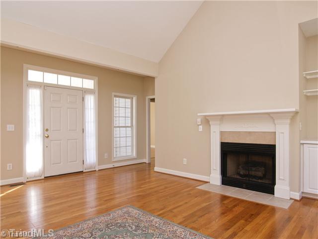 7809 Perthshire Drive Oak Ridge, NC 27310 - Photo 4 of 15 Entry. Windows around the front door let in even more natural light, and give the entry a grand feel.