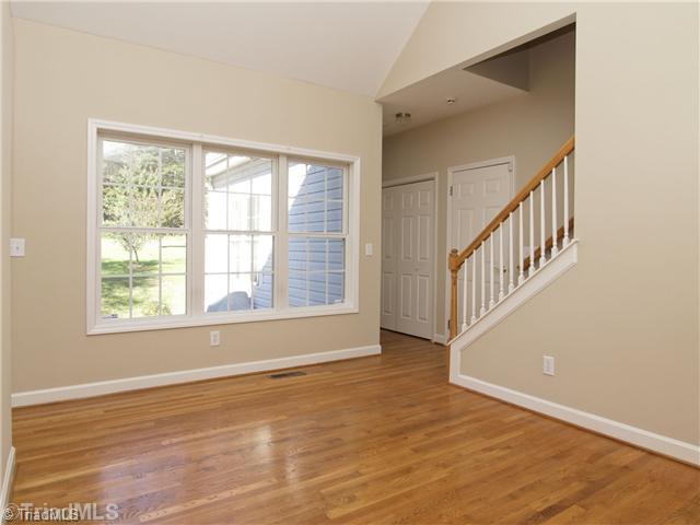 7809 Perthshire Drive Oak Ridge, NC 27310 - Photo 5 of 15 Dining Room. More of those beautiful windows and that lovely view!