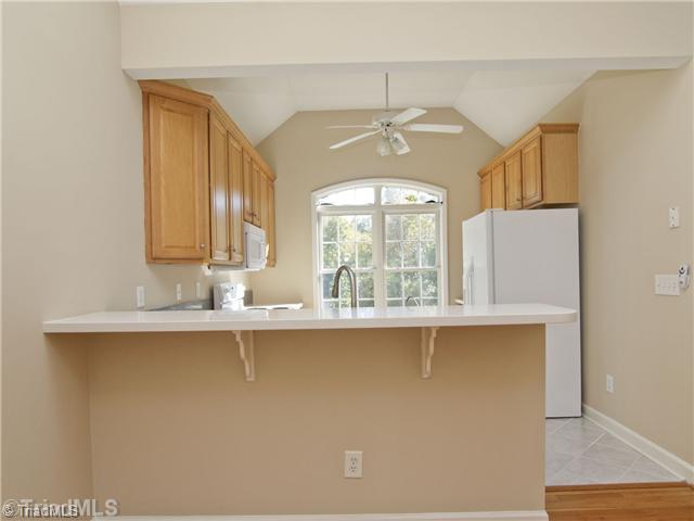 7809 Perthshire Drive Oak Ridge, NC 27310 - Photo 7 of 15 Kitchen. Pull up a stool and enjoy a cup of coffee, breakfast, read the paper, check your emails. This will be your go to spot to start your day, or to finish it.