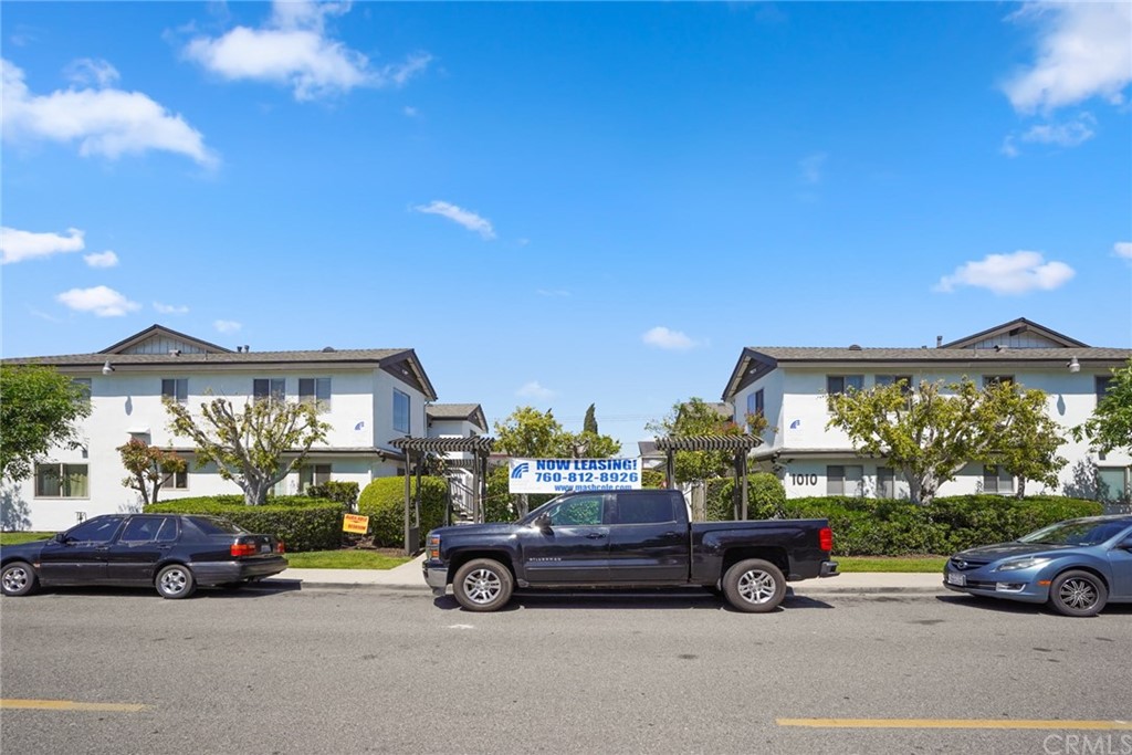 1010-1016 Valencia Street Costa Mesa, CA 92626 - Photo 1 of 5 a car parked in front of a house