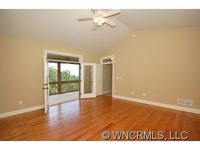 144 Sunny Ridge Road Laurel Park, NC 28739 - Photo 7 of 12 a view of an empty room with a window