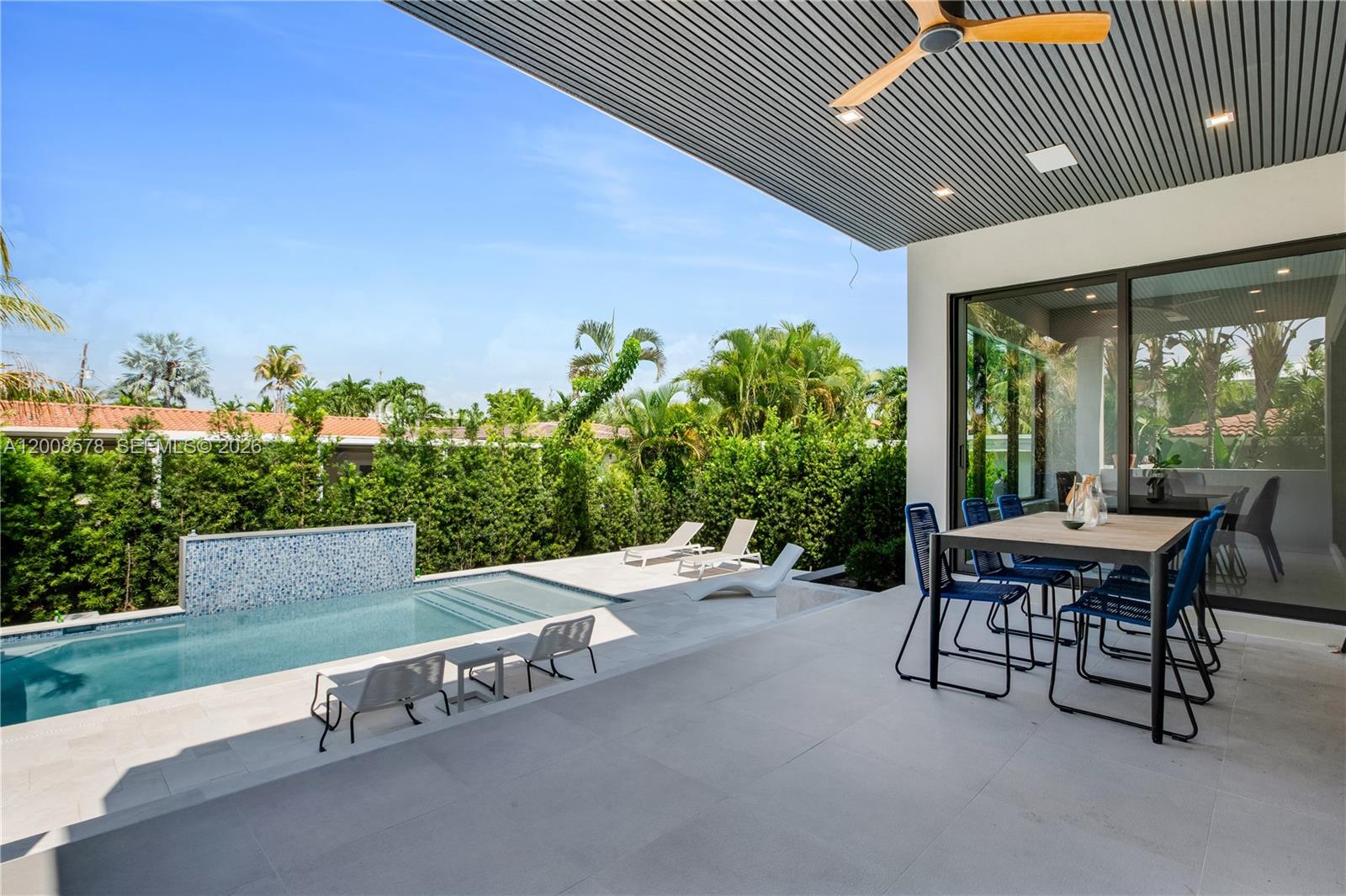 8826 Froude Avenue Surfside, FL 33154 - Photo 7 of 51 a outdoor view with a sitting space