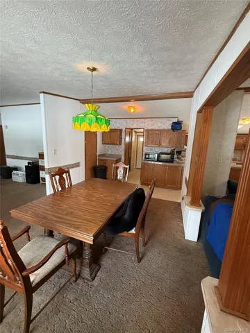 a dining hall with furniture and window