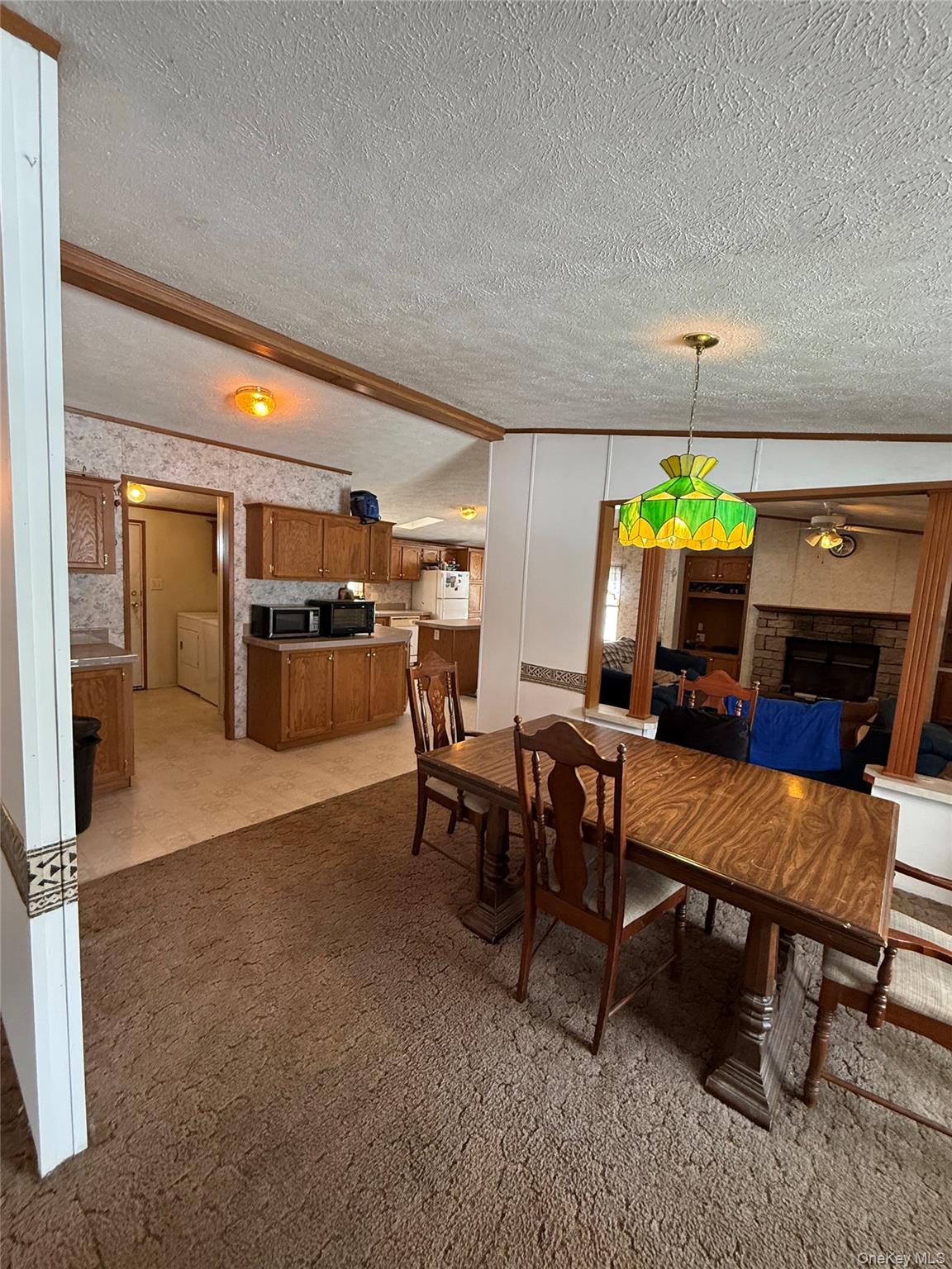263 Mongaup Road Hurleyville, NY 12747 - Photo 10 of 22 a view of a dining room with furniture and window